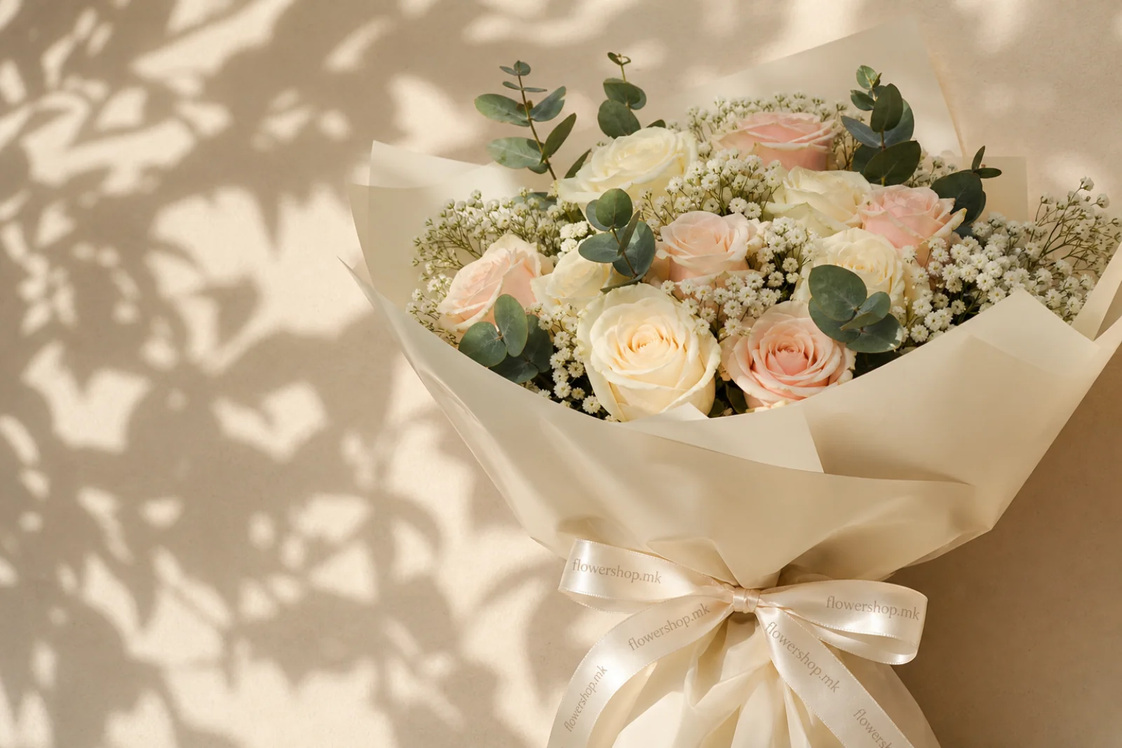 Elegant bouquet of cream and blush roses
